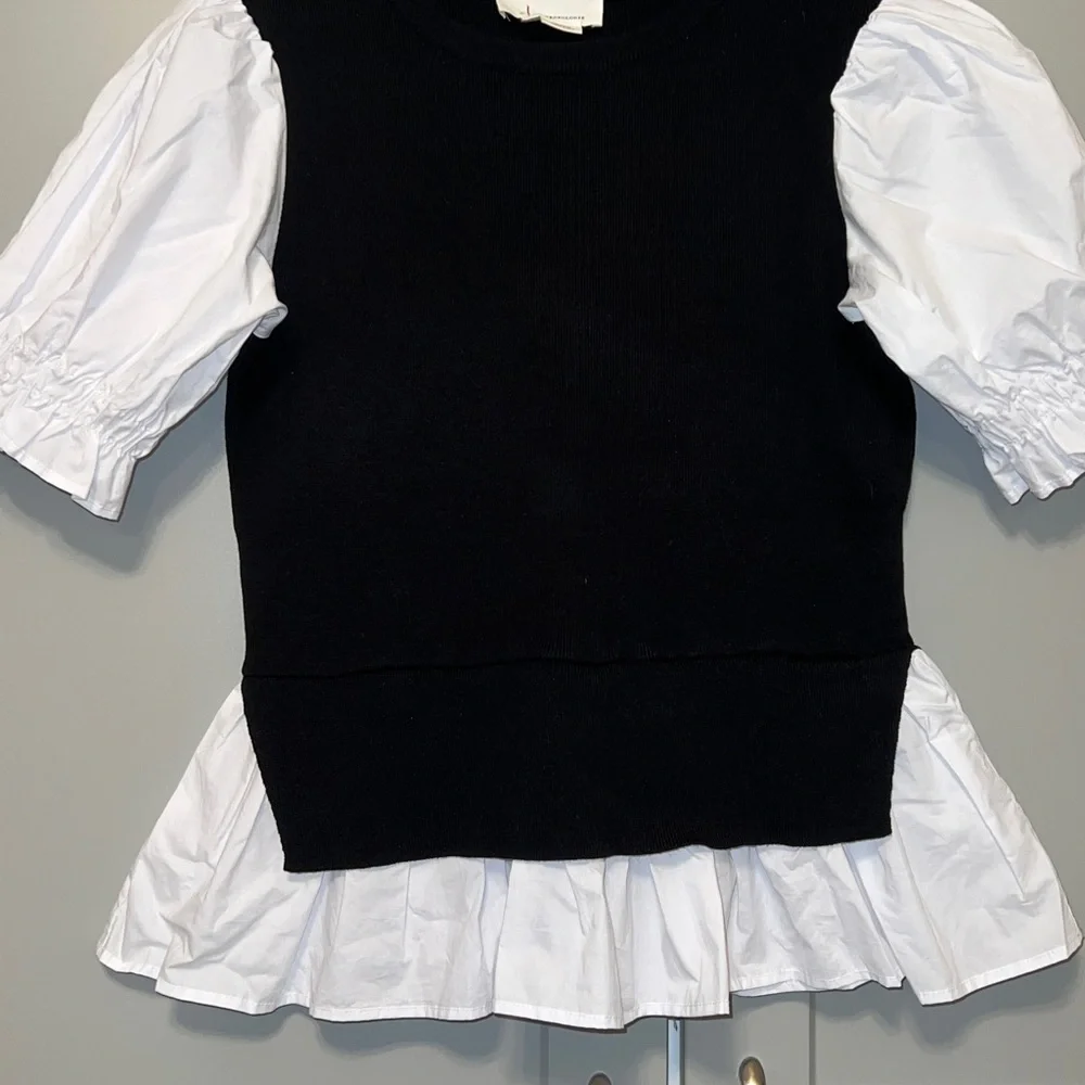 Anthropologie Black and White Ruffle Sleeve Blouse